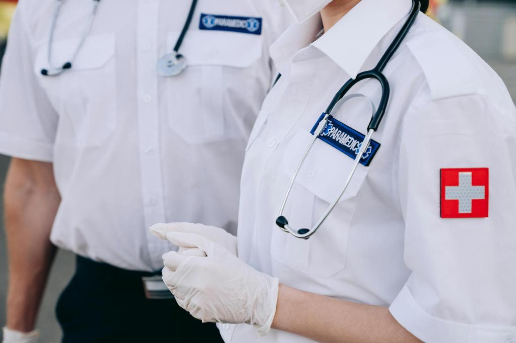 paramedics wearing medical gloves